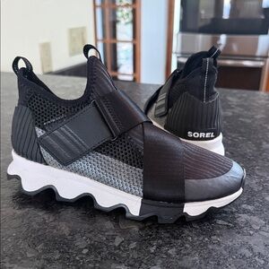 Sorel Black and White Kinetic Sneaker.